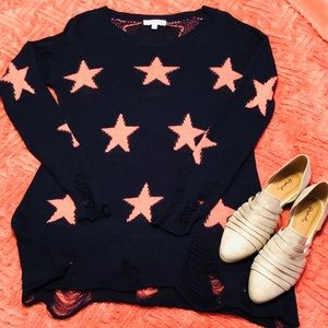 Super cute navy distressed star sweater.